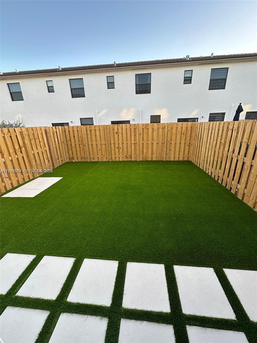 12868 Southwest 232nd Terrace Homestead, FL 33032 - Photo 41 of 48 a view of a backyard with a garden