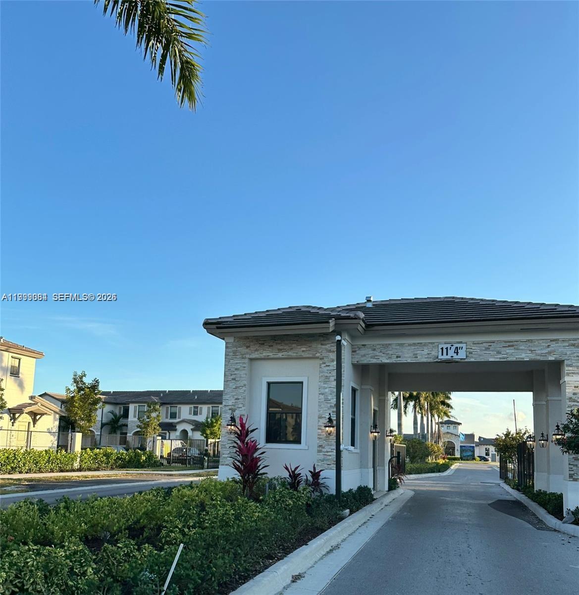 12868 Southwest 232nd Terrace Homestead, FL 33032 - Photo 45 of 48 front view of a house with a street