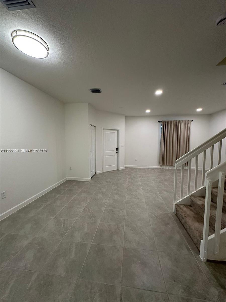12868 Southwest 232nd Terrace Homestead, FL 33032 - Photo 8 of 48 a view of an empty room