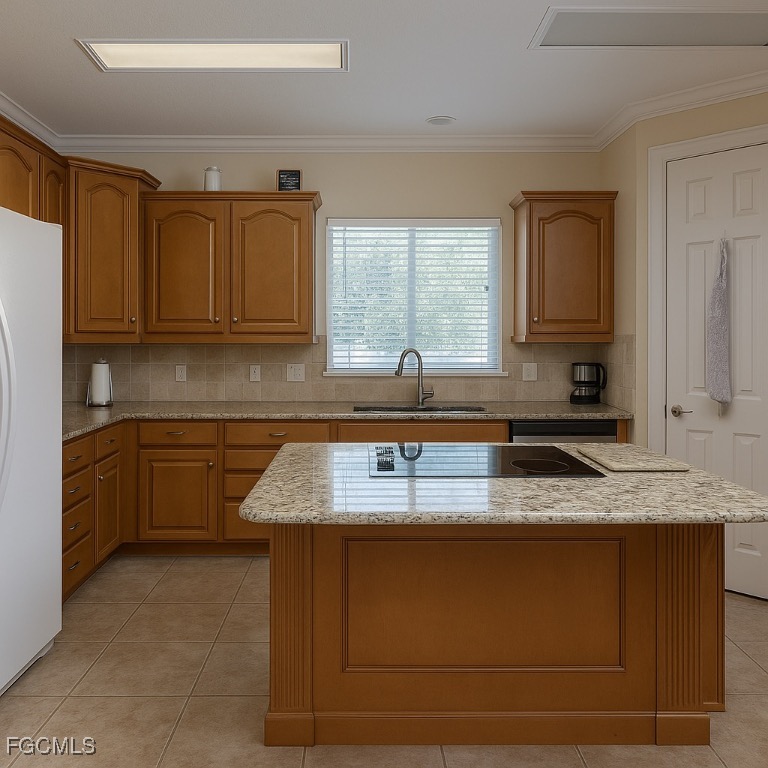 965 Stenstrom Road Wauchula, FL 33873 - Photo 12 of 25 a kitchen with granite countertop a sink a stove and cabinets