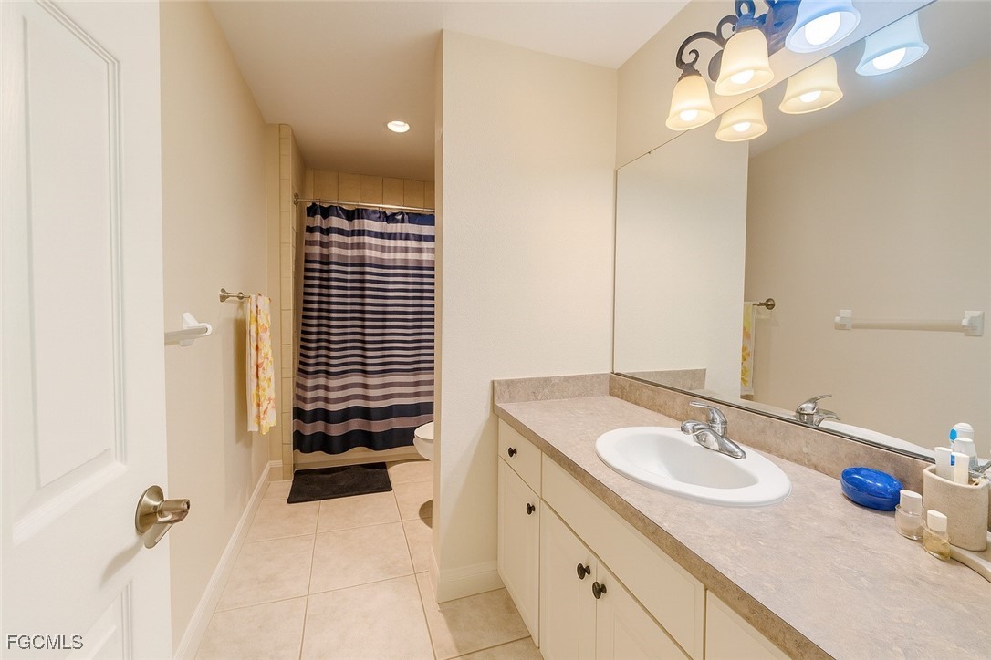 965 Stenstrom Road Wauchula, FL 33873 - Photo 21 of 25 a bathroom with a sink double vanity and a mirror