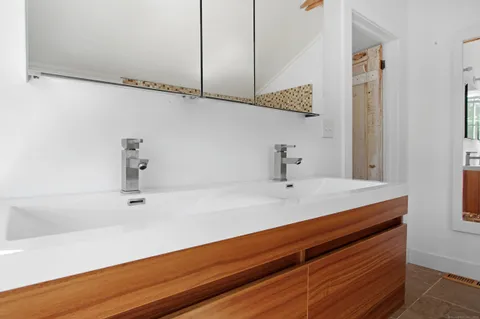 a bathroom with a sink and a bathtub