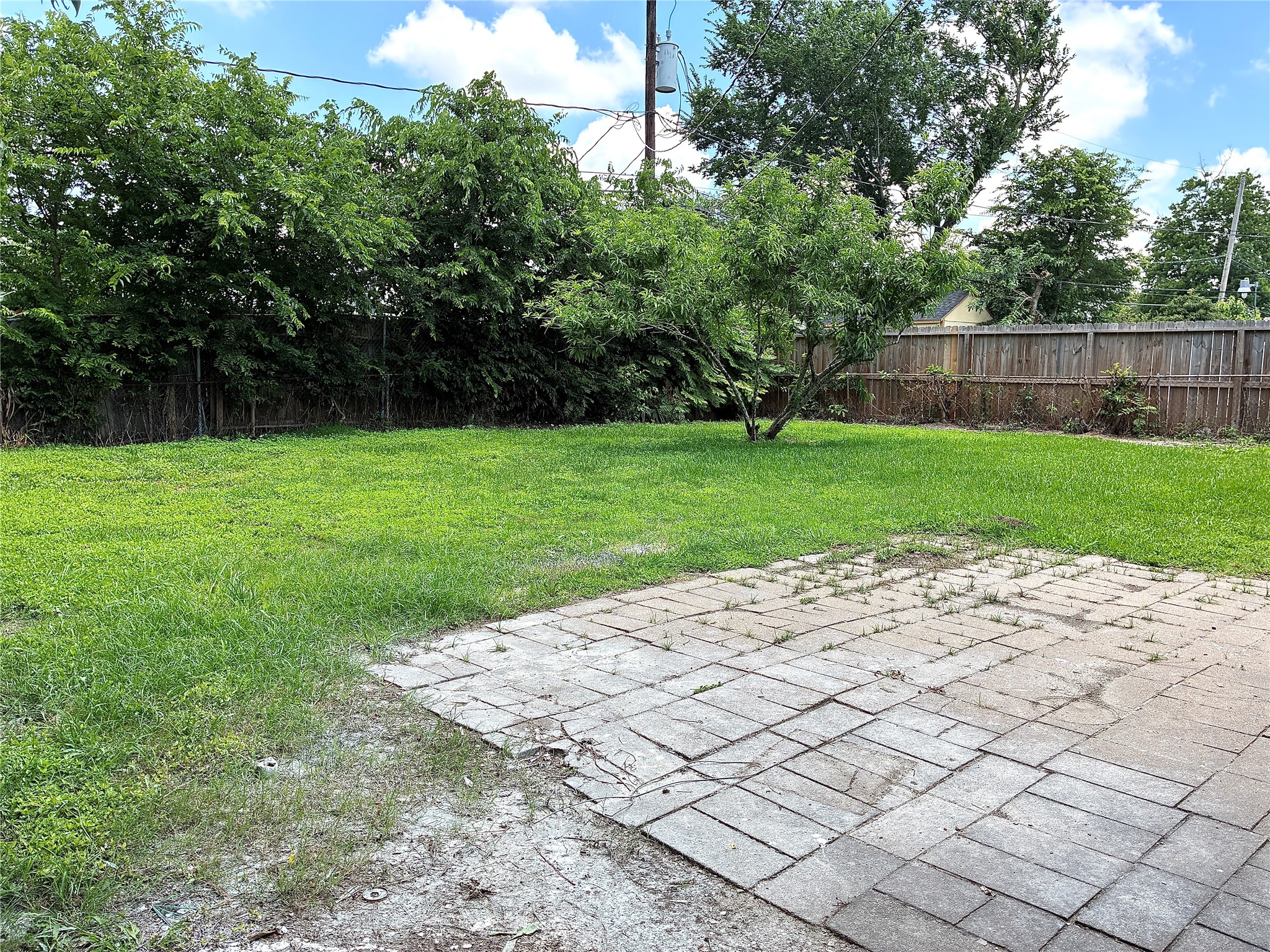 631 Roper Street Houston, TX 77034 - Photo 4 of 15 Backyard with patio. Great for relaxing and entertaining!