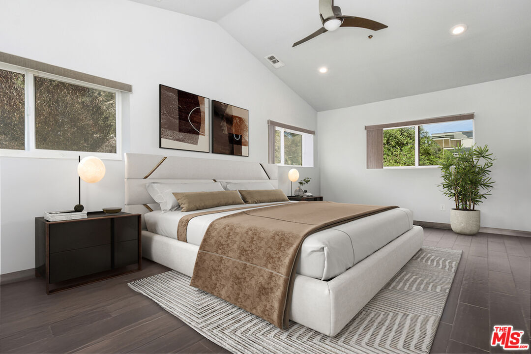 2447 Stonyvale Road Tujunga, CA 91042 - Photo 13 of 33 a bedroom with bed and a large window