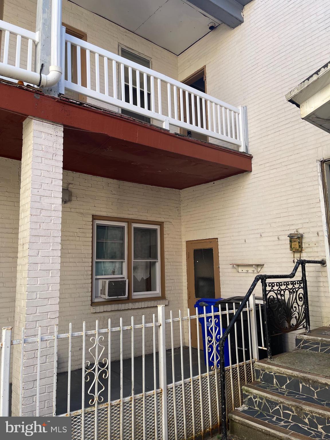 1139 Church Street, Unit D Reading, PA 19601 - Photo 2 of 6 a view of a house with iron stairs