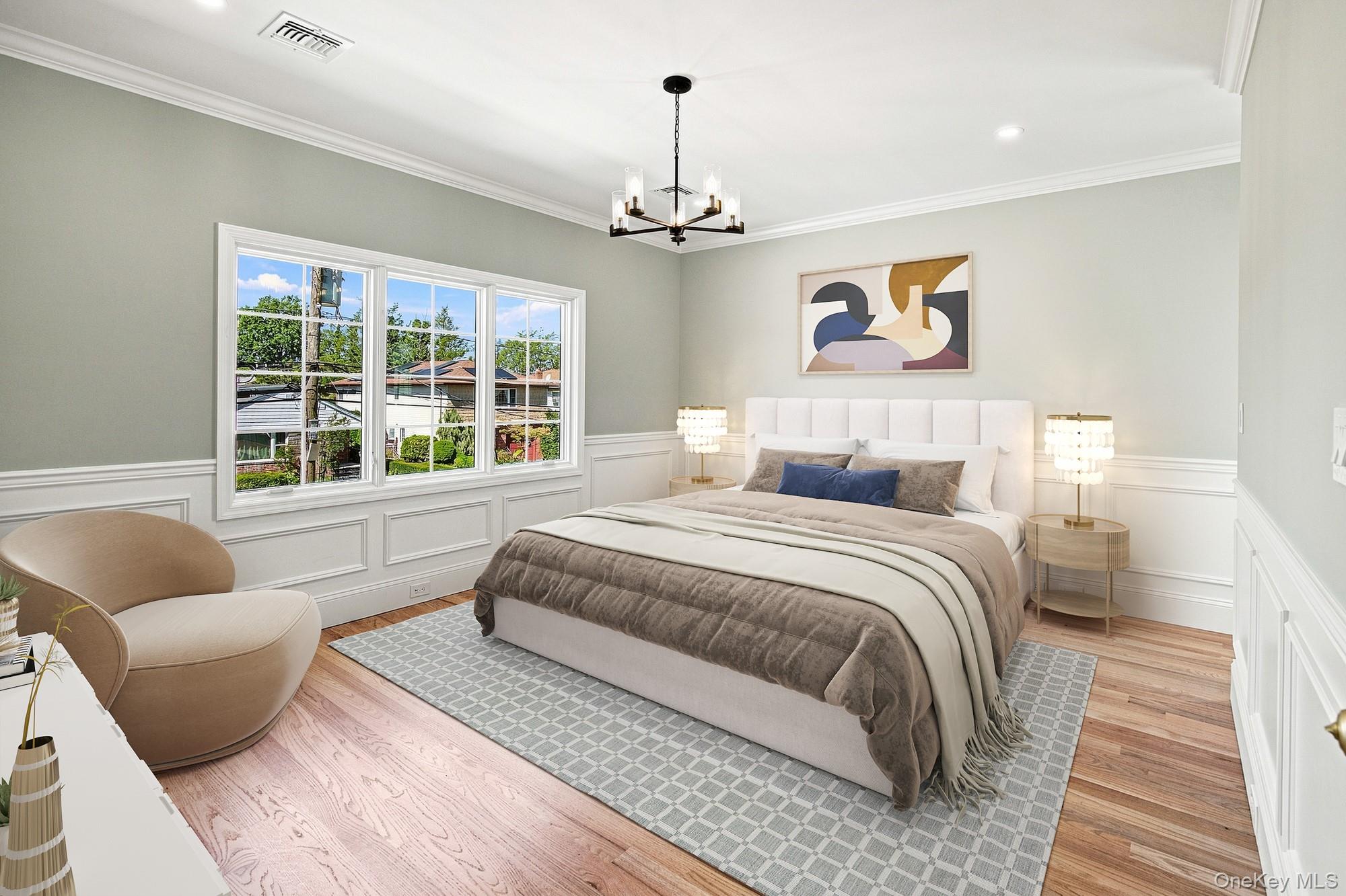148 Latham Road Mineola, NY 11501 - Photo 18 of 27 Primary Bedroom with hardwood flooring, crown molding, wainscoting, recessed lighting.VIRTUAL STAGING
