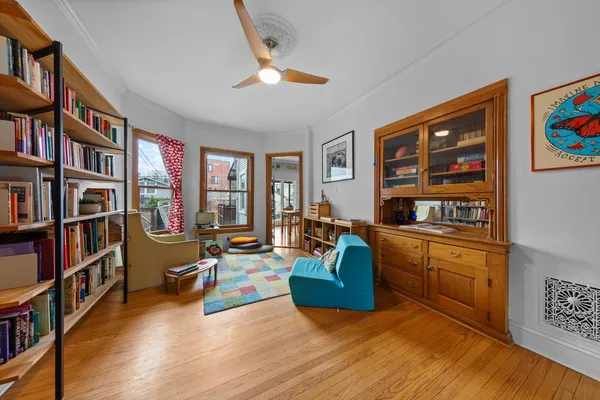 a bedroom with bed and a window