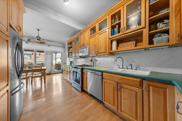 an entryway and livingroom with furniture