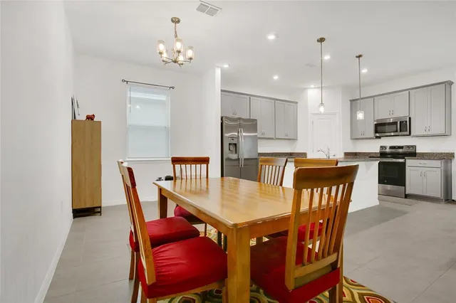 a view of a dining room with furniture