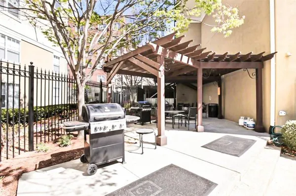 a room with furniture and pool table
