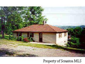 0 Pond Road Mehoopany, PA 18629 - Photo 1 of 2 a backyard of a house with garden