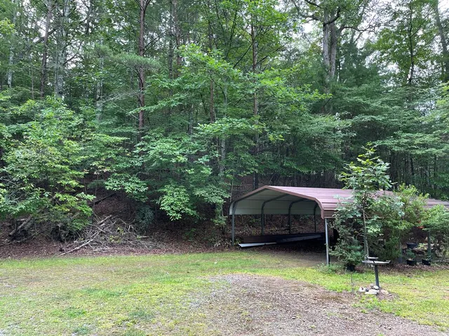 a house with trees in the background