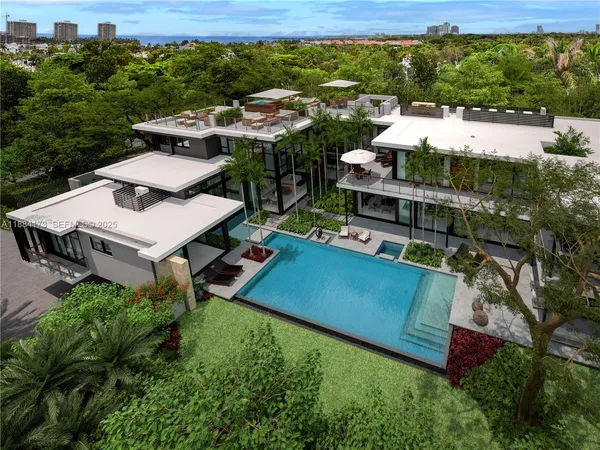 an aerial view of a house with a garden