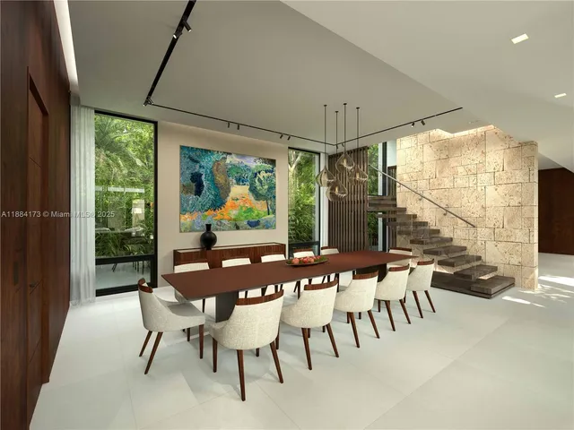 a dining room with furniture a chandelier and wooden floor