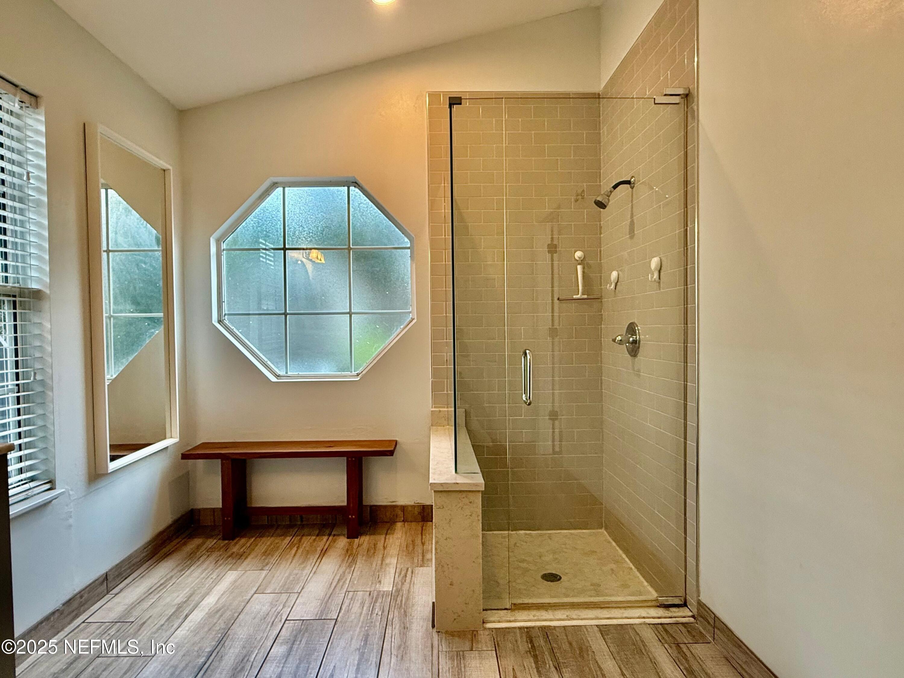 168 Patrick Mill Circle Ponte Vedra Beach, FL 32082 - Photo 15 of 33 a bathroom with a sink shower and a mirror
