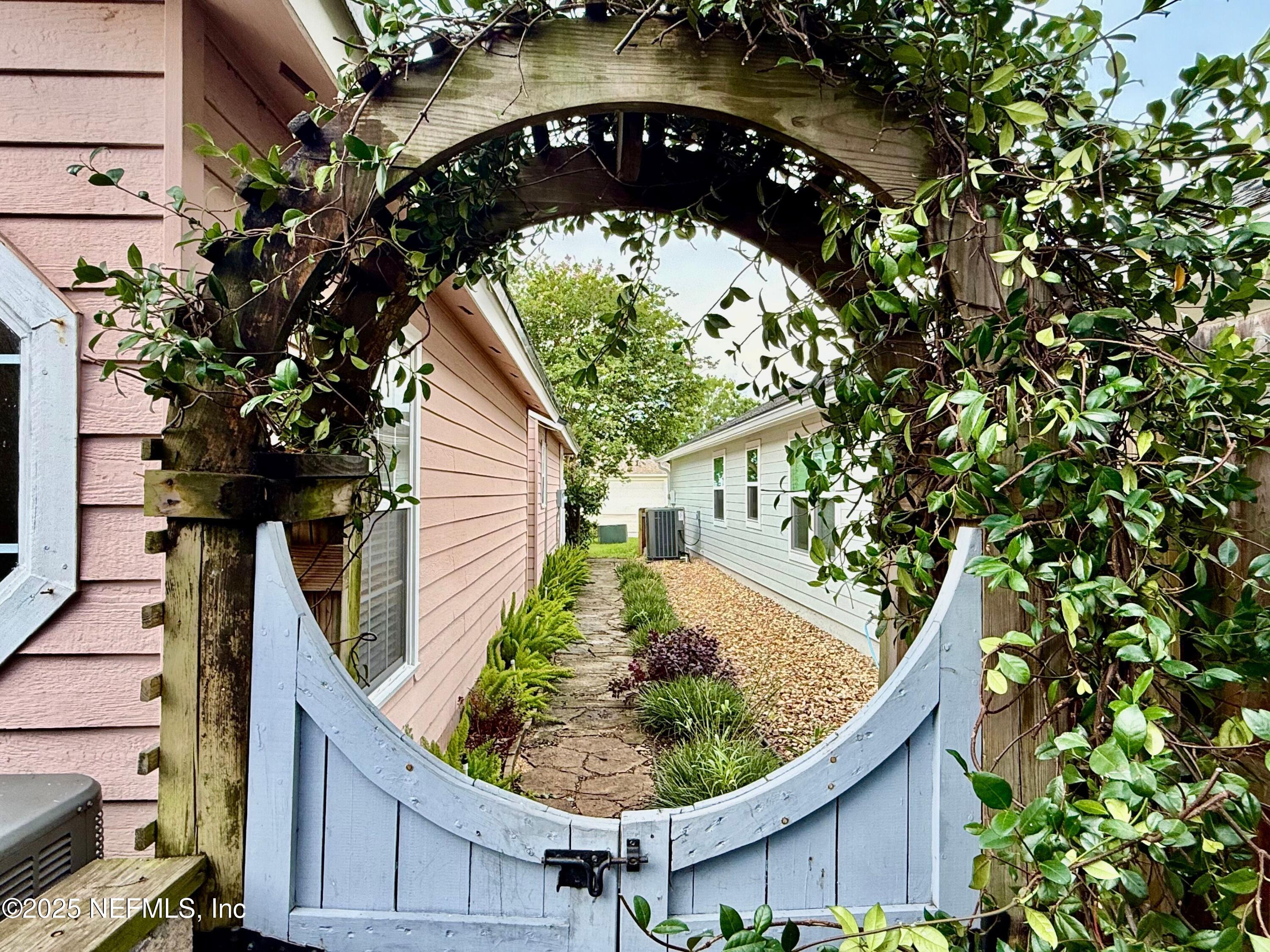 168 Patrick Mill Circle Ponte Vedra Beach, FL 32082 - Photo 26 of 33 a picture of a tree in front of a house