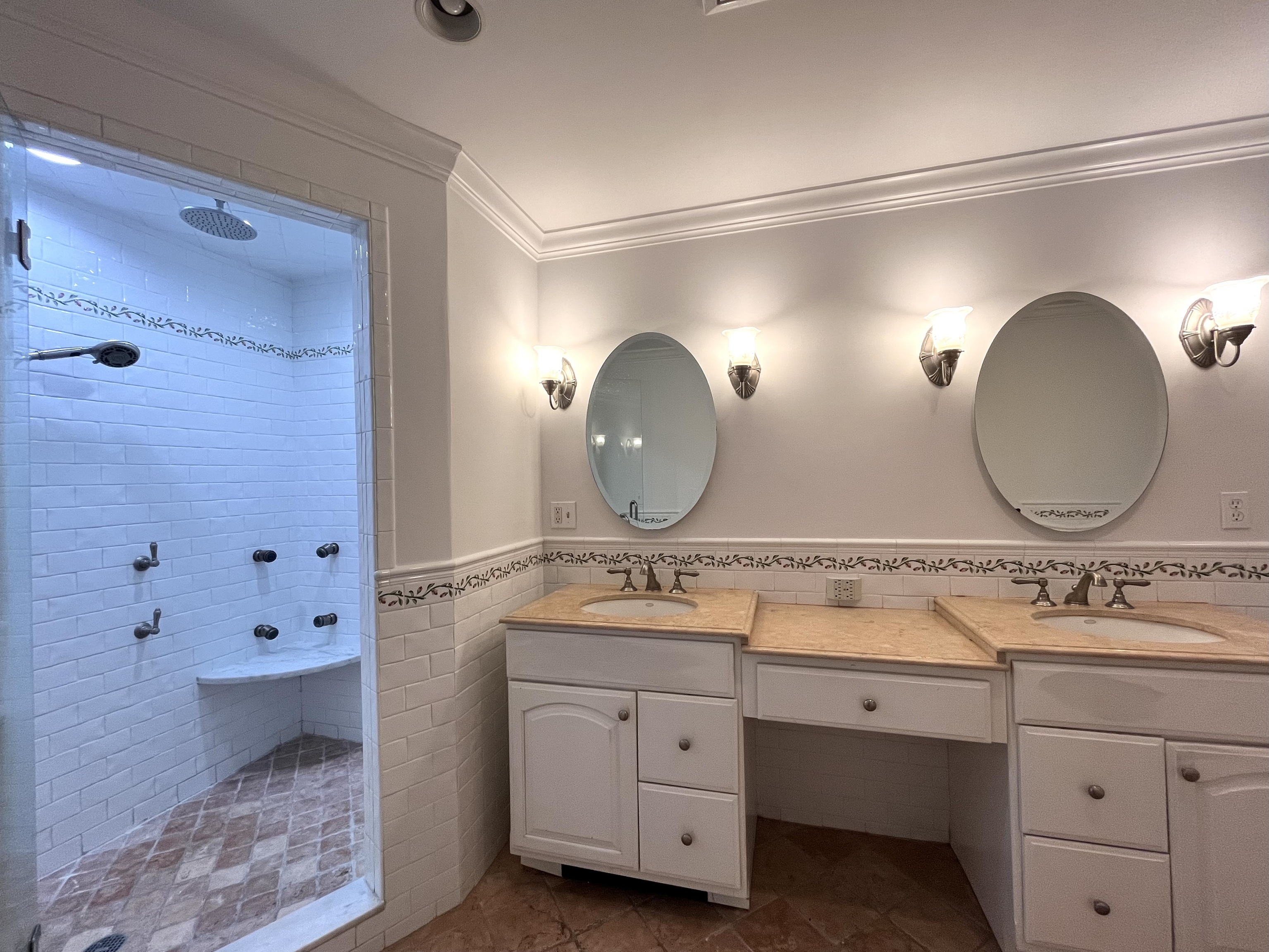 158 Jelliff Mill Road New Canaan, CT 06840 - Photo 22 of 40 a bathroom with a double vanity sink mirror and shower