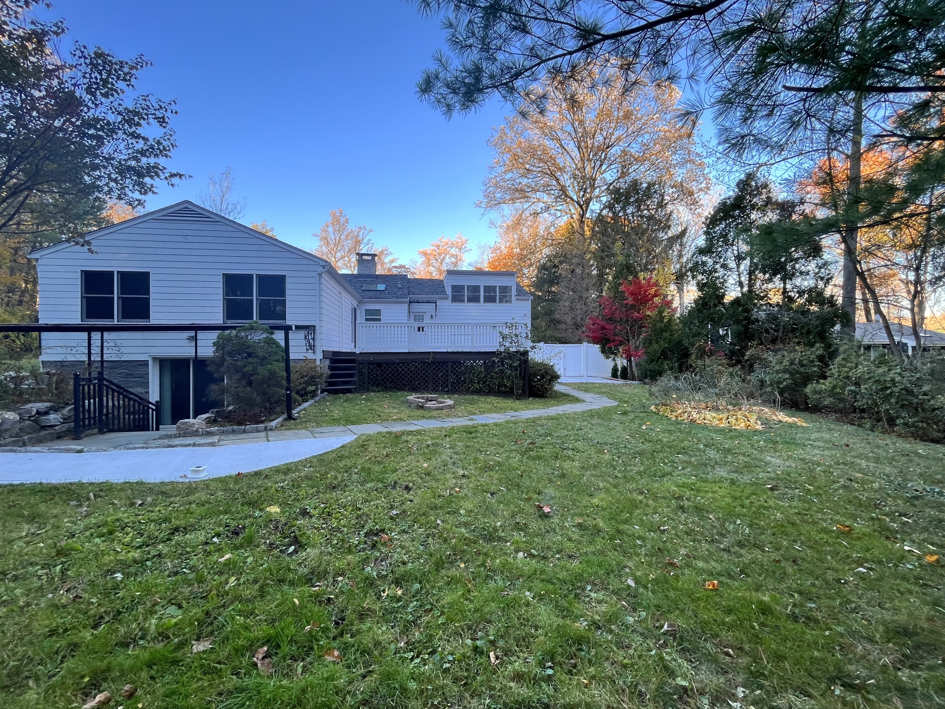 158 Jelliff Mill Road New Canaan, CT 06840 - Photo 39 of 40 a view of a house with a big yard plants and large tree