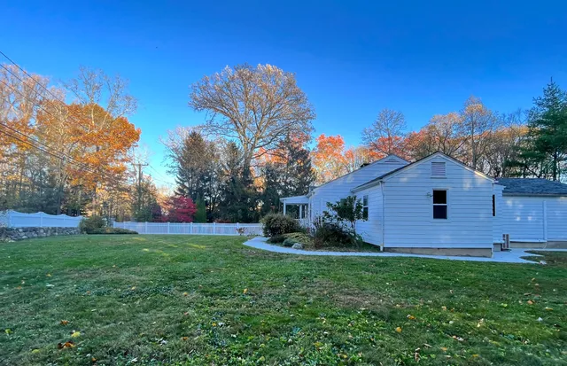 a view of a kitchen with microwave and cabinets