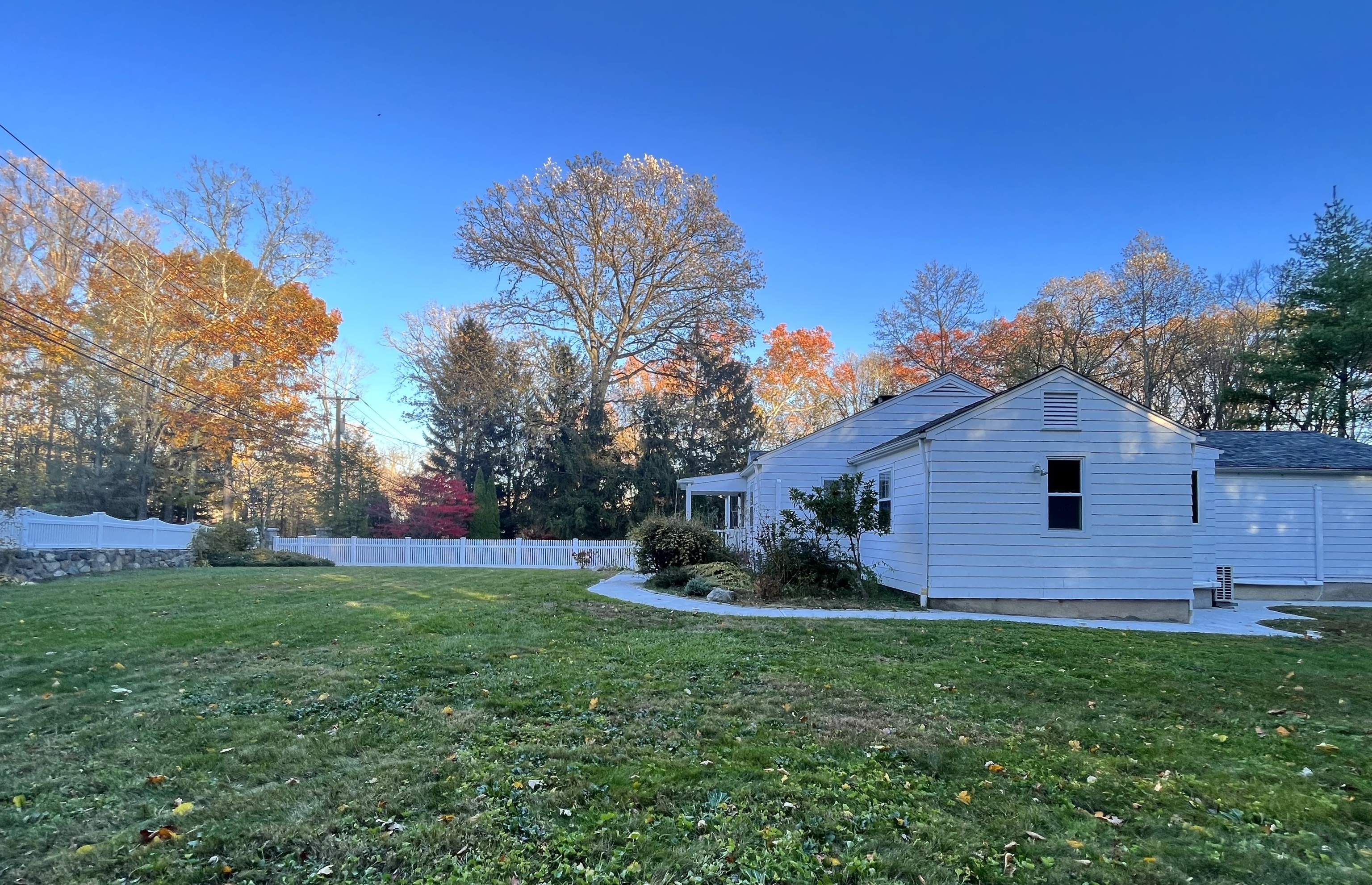 158 Jelliff Mill Road New Canaan, CT 06840 - Photo 4 of 40 a front view of a house with garden