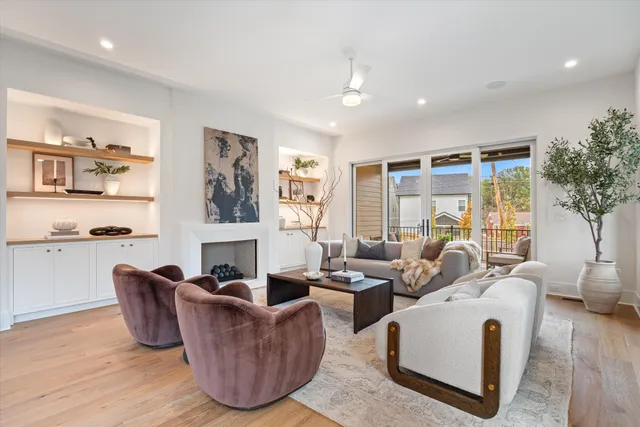 a living room with furniture and a window