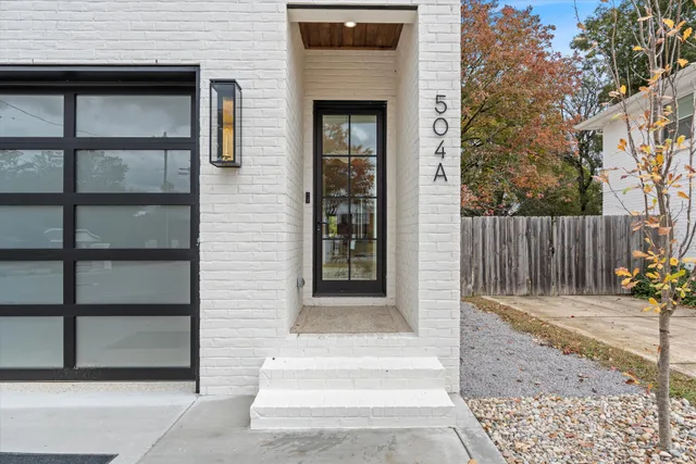 a front view of a house with a gate