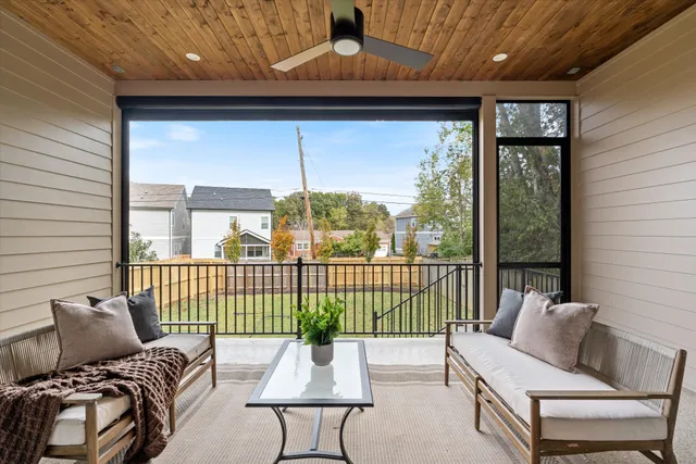 a outdoor space with patio the couches and a potted plant with outer view