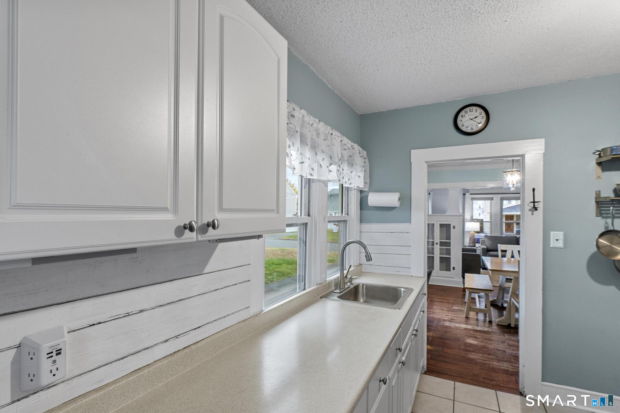 64 Douglas Road Bristol, CT 06010 - Photo 22 of 40 a view of living room with furniture and wooden floor
