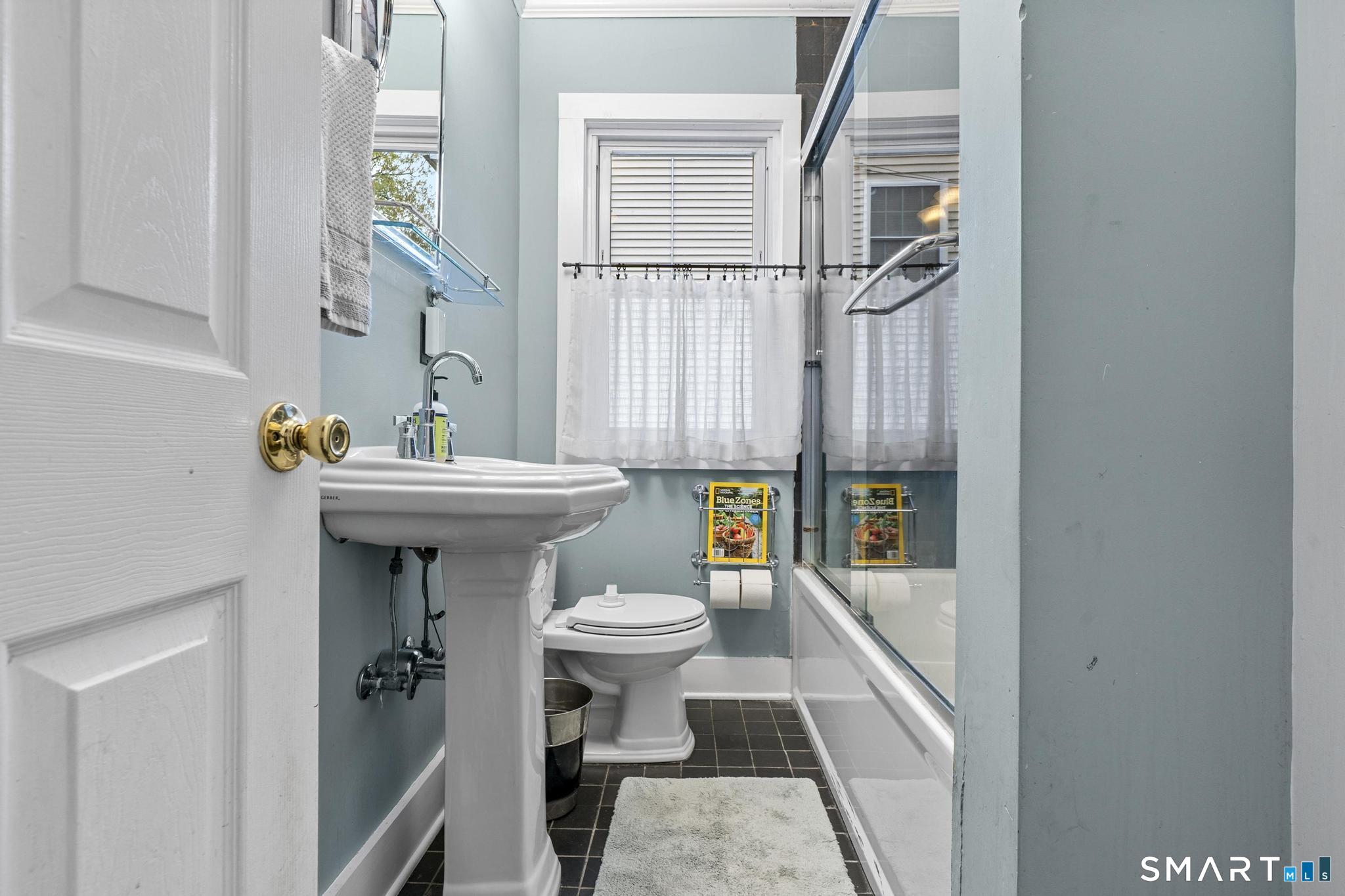 64 Douglas Road Bristol, CT 06010 - Photo 28 of 40 a bathroom with a sink toilet and shower