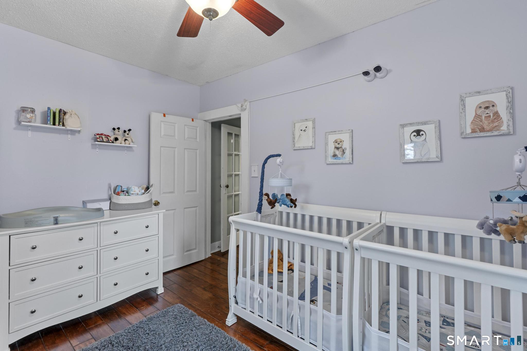 64 Douglas Road Bristol, CT 06010 - Photo 31 of 40 a bedroom with furniture and baby crib