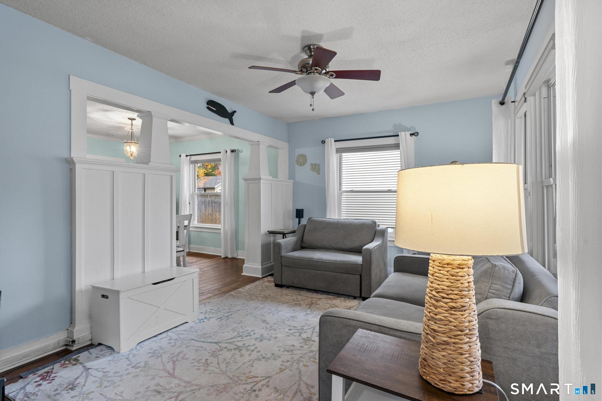 64 Douglas Road Bristol, CT 06010 - Photo 5 of 40 a living room with furniture and a window
