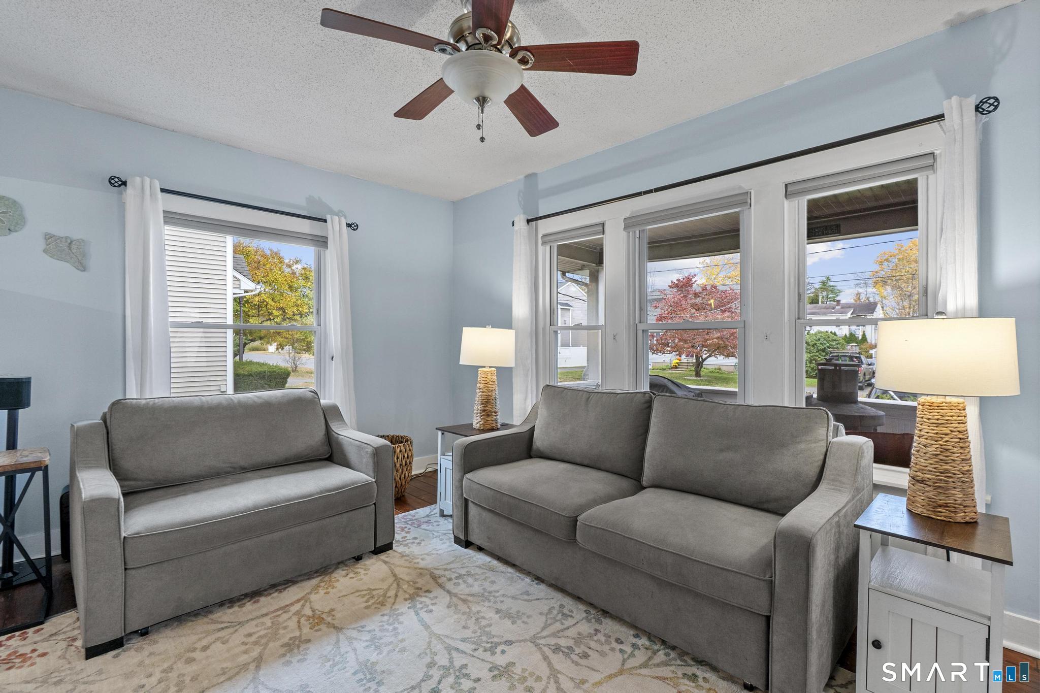 64 Douglas Road Bristol, CT 06010 - Photo 6 of 40 a living room with furniture and a window