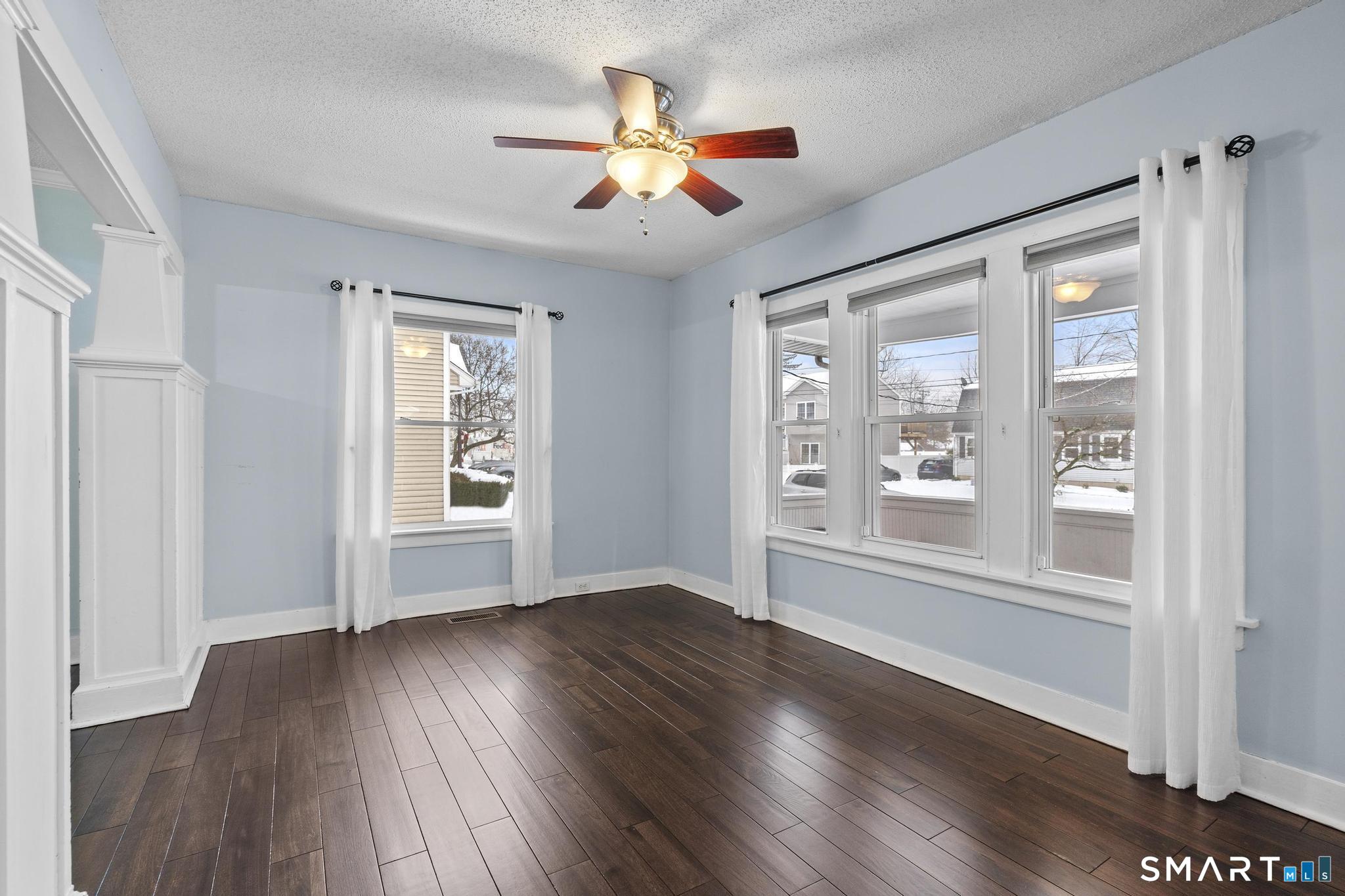 64 Douglas Road Bristol, CT 06010 - Photo 10 of 40 wooden floor in an empty room with a window