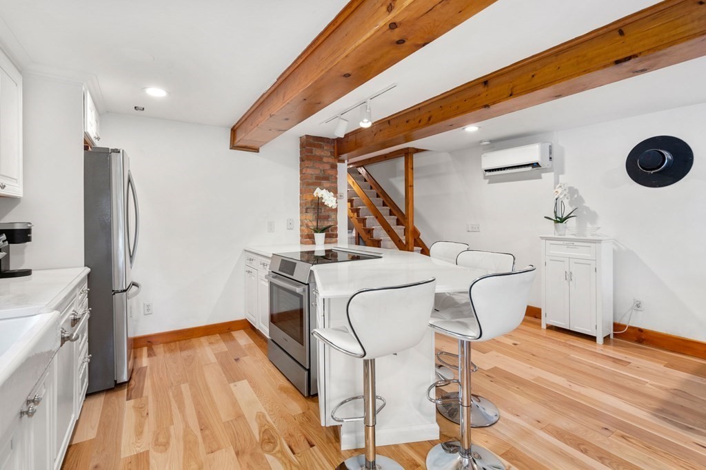 10 Beech Road Wayland, MA 01778 - Photo 7 of 42 a very nice looking room with a large window