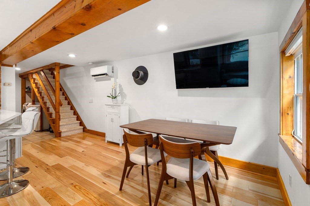 10 Beech Road Wayland, MA 01778 - Photo 9 of 42 a living room with furniture and a flat screen tv