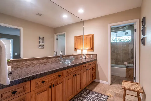 an outdoor sitting area with furniture and outdoor space