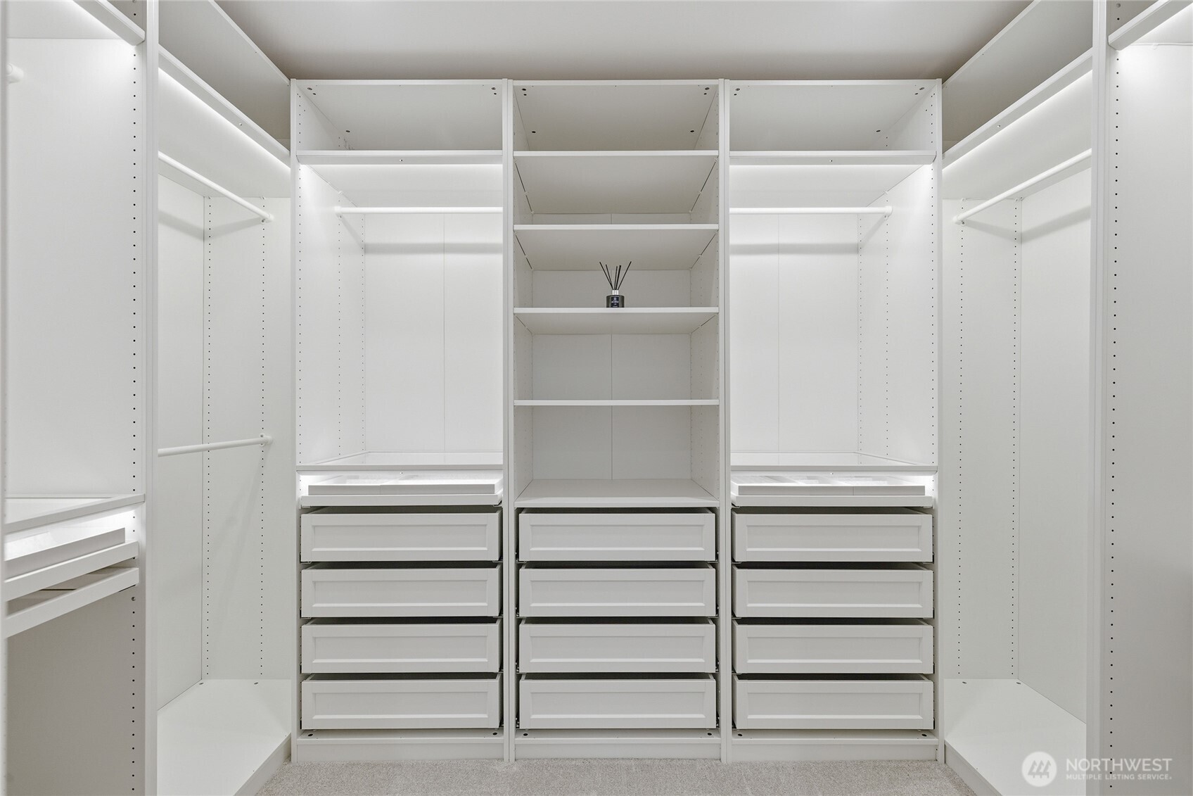 719 Edmonds Way Edmonds, WA 98020 - Photo 23 of 40 a view of walk in closet with empty racks