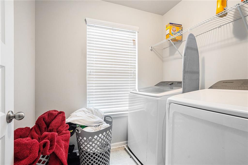 2428 Hanover Woods Road Lithonia, GA 30058 - Photo 18 of 26 a bathroom with a sink and a toilet
