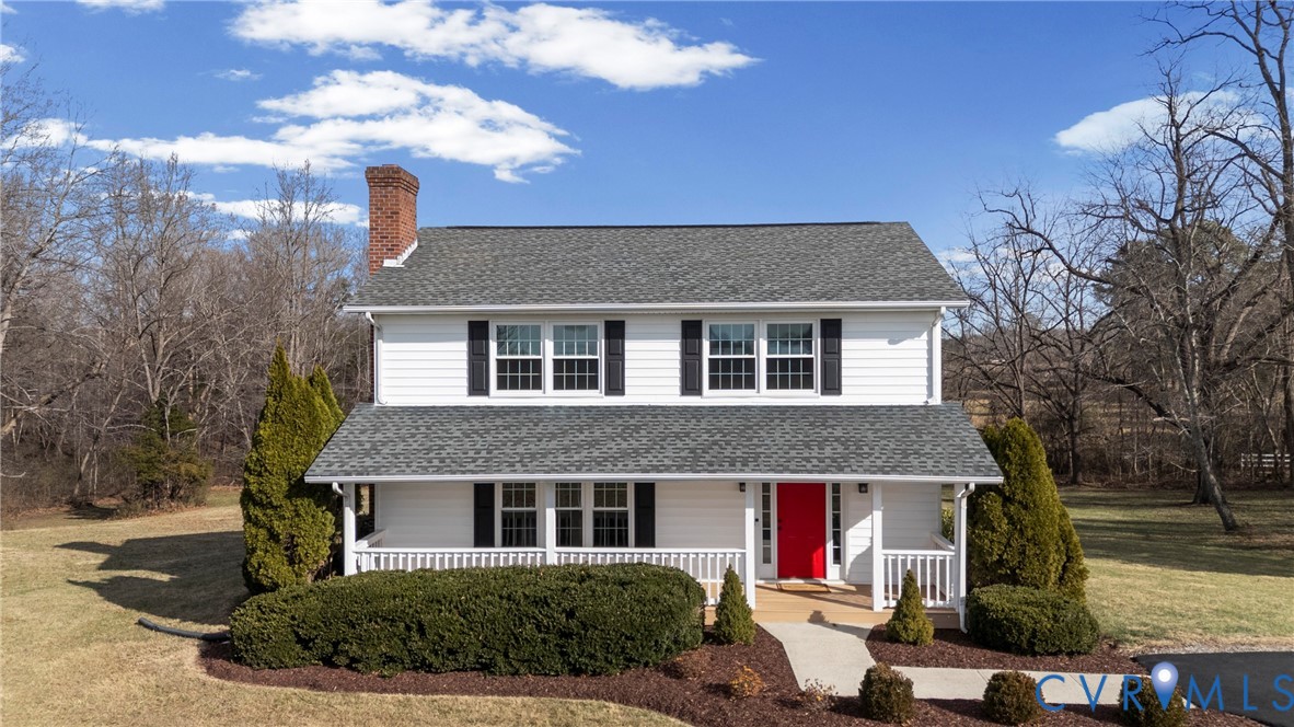 Traditional-style home featuring a porch, a front