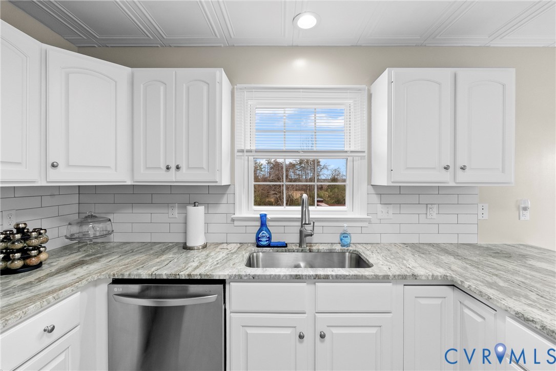 842 Hardtimes Road Farmville, VA 23901 - Photo 13 of 50 Kitchen featuring dishwasher, white cabinetry, lig