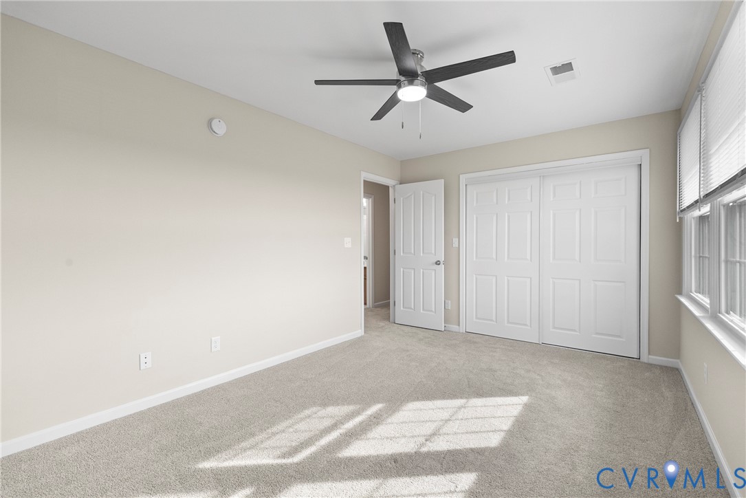 842 Hardtimes Road Farmville, VA 23901 - Photo 25 of 50 Unfurnished bedroom featuring light carpet, a clos