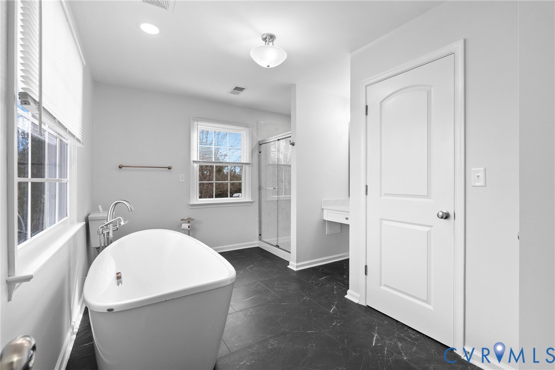 842 Hardtimes Road Farmville, VA 23901 - Photo 32 of 50 Full bath featuring a soaking tub, a shower stall,