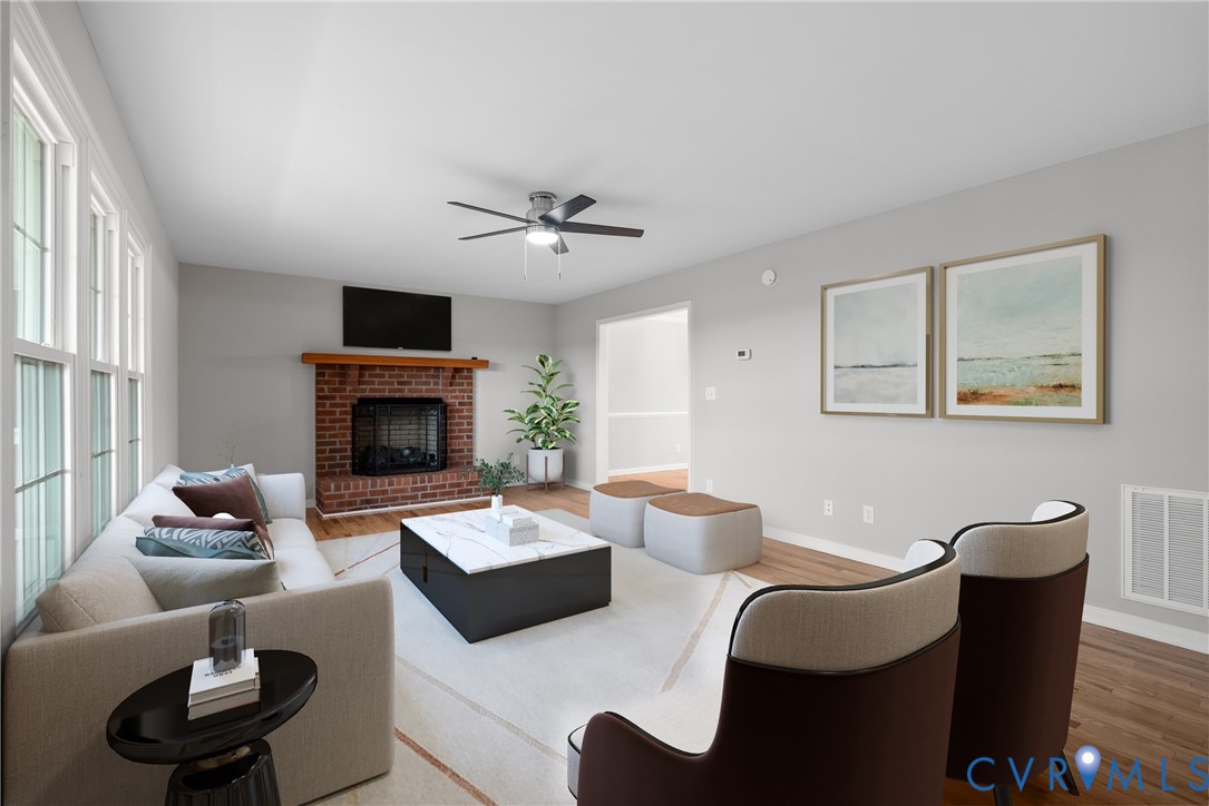 842 Hardtimes Road Farmville, VA 23901 - Photo 4 of 50 Living area featuring a brick fireplace, wood fini