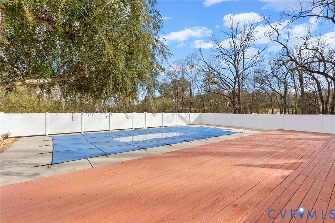 842 Hardtimes Road Farmville, VA 23901 - Photo 45 of 50 View of pool featuring a deck and a fenced backyar