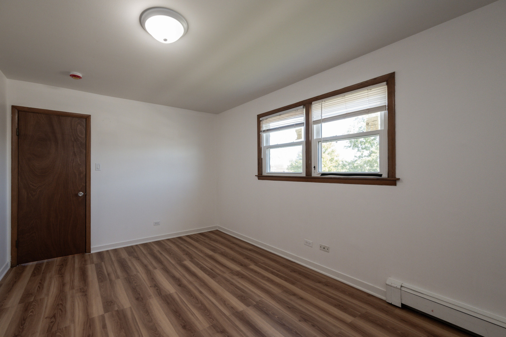 14450 Jefferson Avenue, Unit 2E Orland Park, IL 60462 - Photo 8 of 8 an empty room with a window