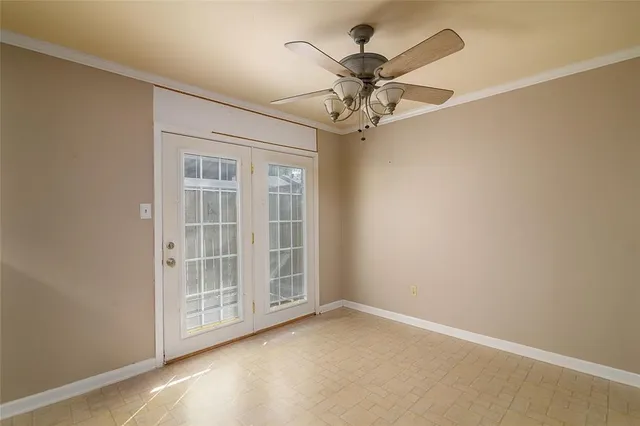 an empty room with windows