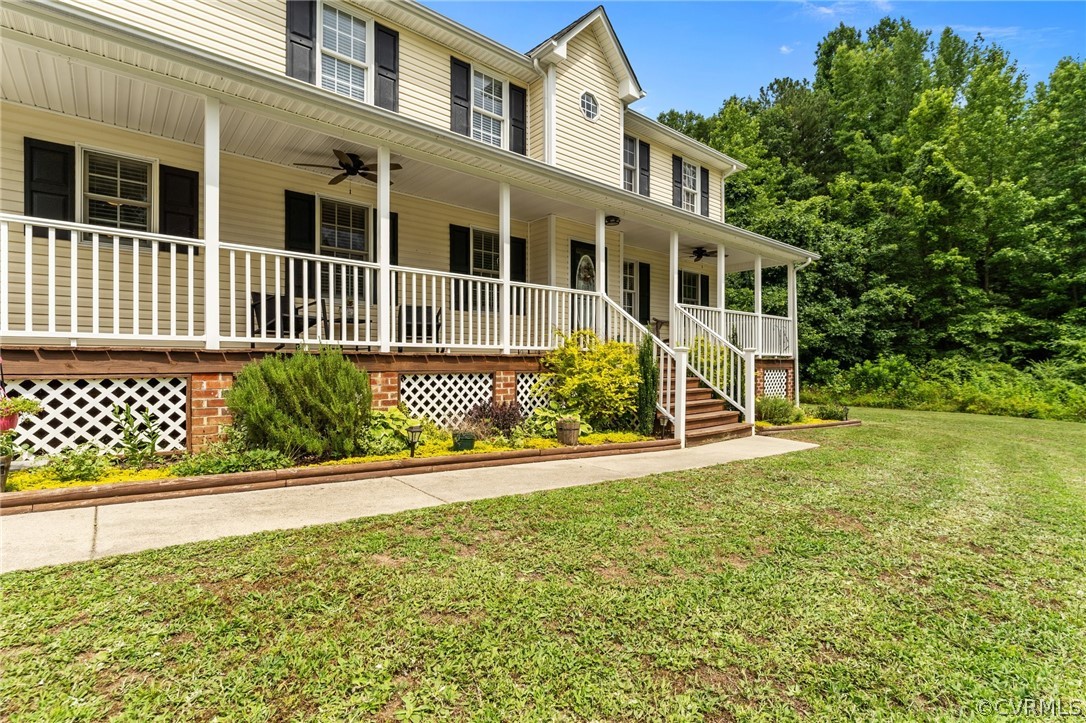 14419 Gatewood Road Dewitt, VA 23840 - Photo 2 of 36 a front view of a house with a yard
