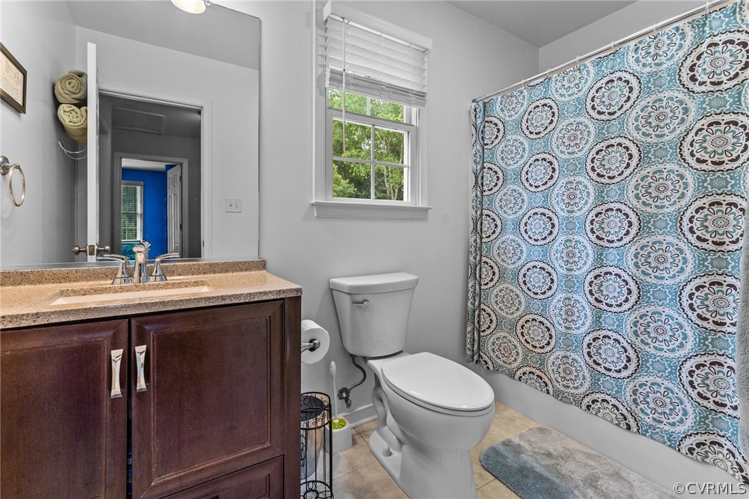 14419 Gatewood Road Dewitt, VA 23840 - Photo 23 of 36 a bathroom with a toilet sink and a mirror