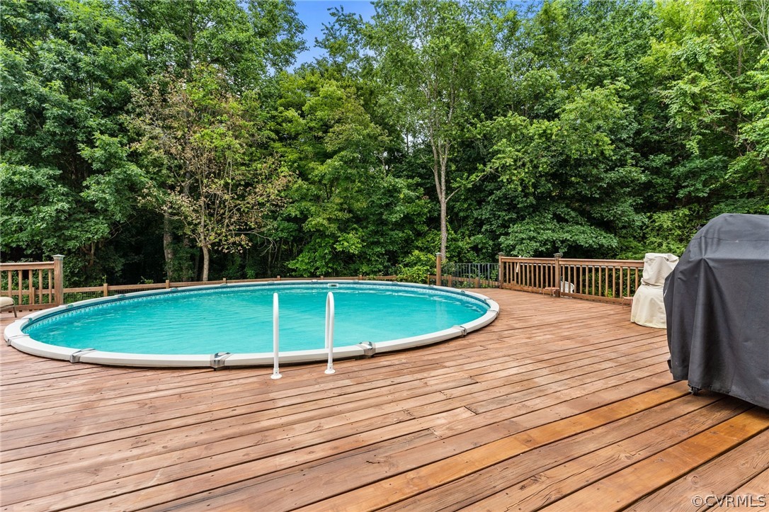 14419 Gatewood Road Dewitt, VA 23840 - Photo 32 of 36 a view of a swimming pool with a patio