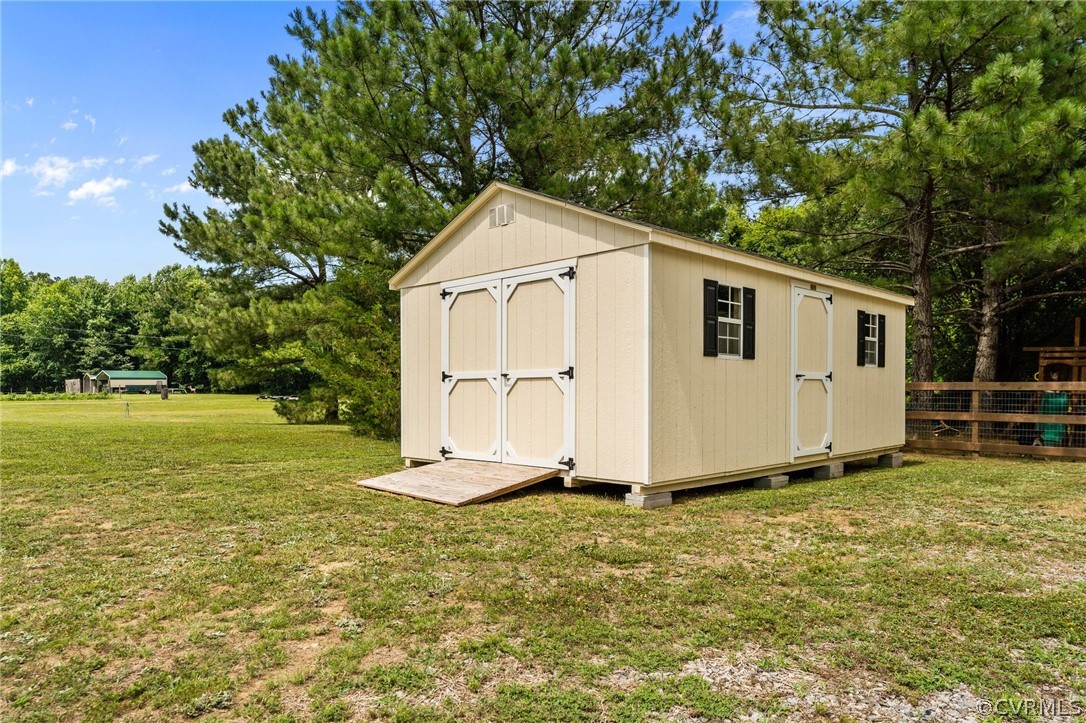 14419 Gatewood Road Dewitt, VA 23840 - Photo 34 of 36 a view of a backyard with white fence